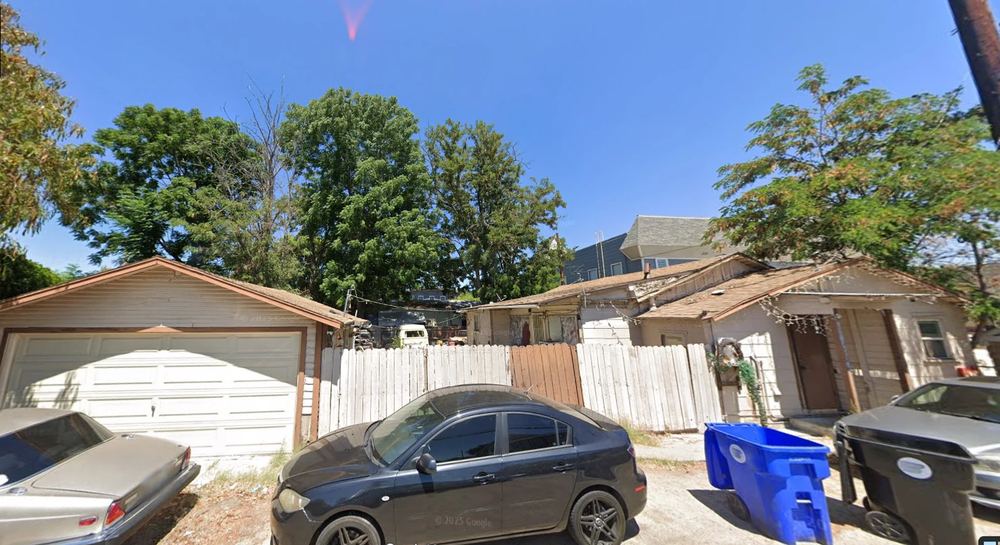 Garage and rooflines from the alley